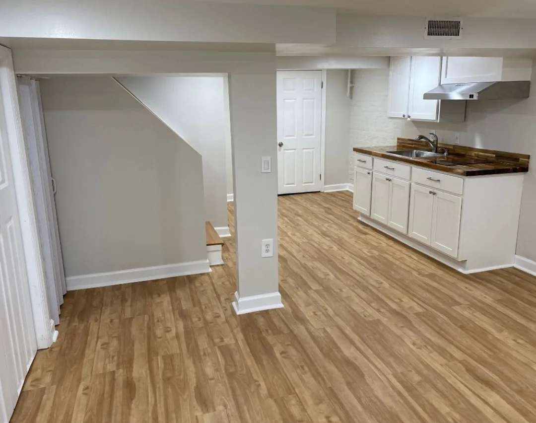 Finished lower level with carpet and recessed lighting