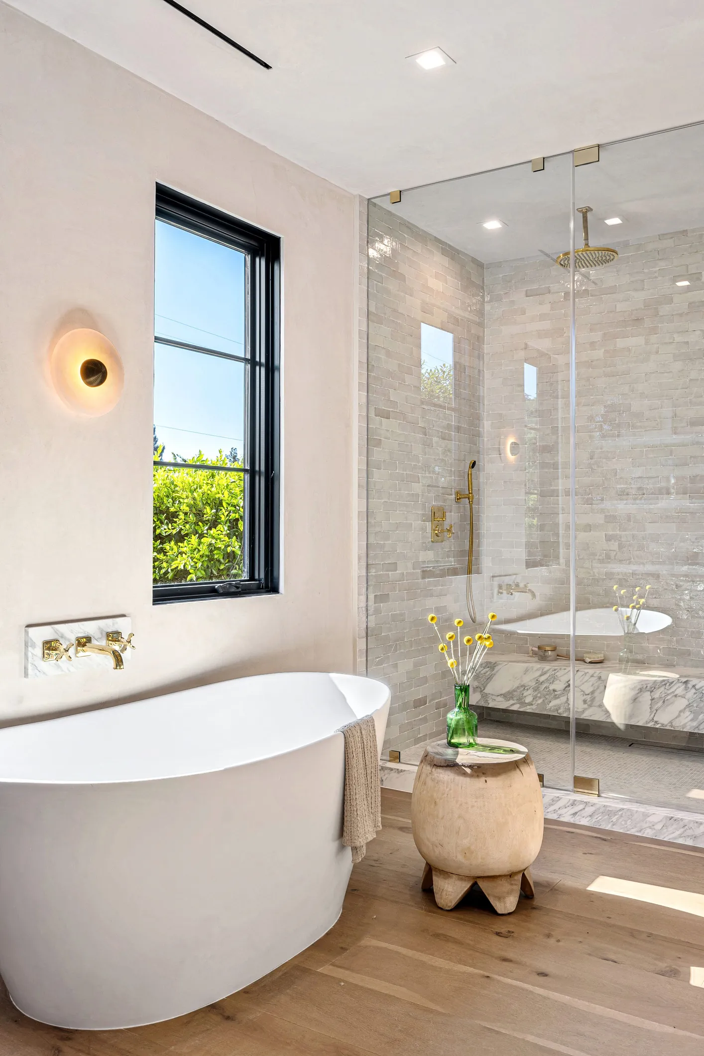 Luxury bathroom remodel with freestanding tub and glass shower by DMV Home Improvement