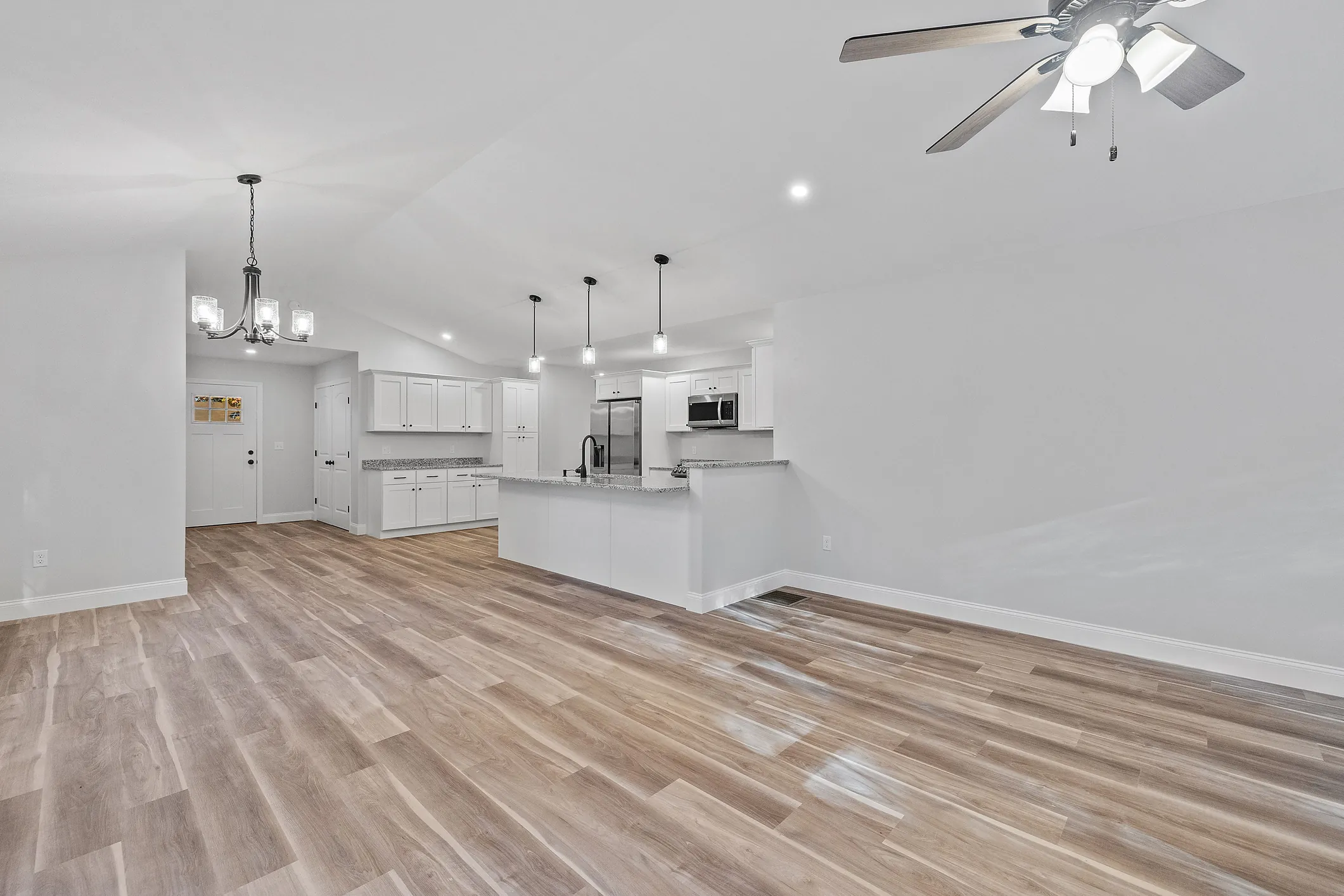Wood flooring carried through an open main floor